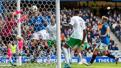 Rangrs' Cyriel Dessers sees his header saved by Josef Bursik