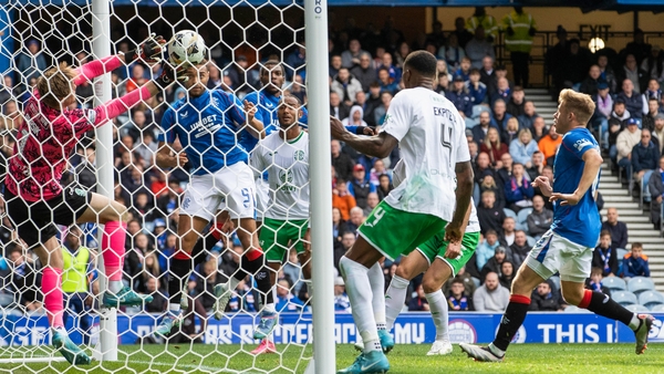 Rangrs' Cyriel Dessers sees his header saved by Josef Bursik
