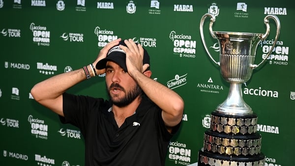 Angel Hidalgo with the trophy after his triumph on home soil