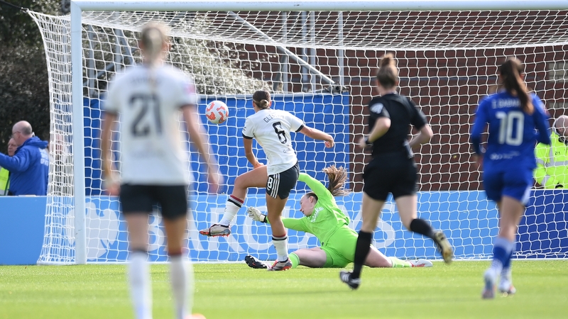 Grace Clinton scores past Ireland and Everton goalkeeper Courtney Brosnan