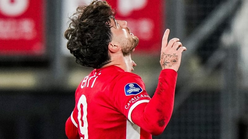 Troy Parrott celebrates his goal for AZ