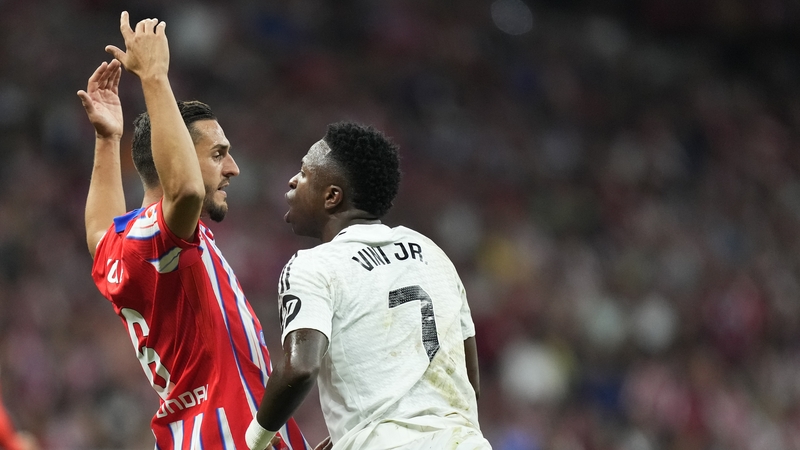 Koke of Atletico and Real's Vinicius Jnr get into it