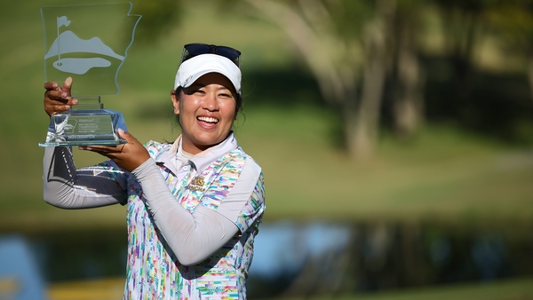 Jasmine Suwannapura poses with the trophy