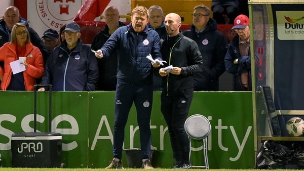 Shelbourne manager Damien Duff cuts an animated figure on the Tolka Park sideline alongside fourth official Marc Lynch