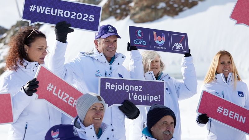 Volunteers pose for a photo at the Uefa Women's Euro 2025 Ticket and Volunteer Launch Event in Switzerland