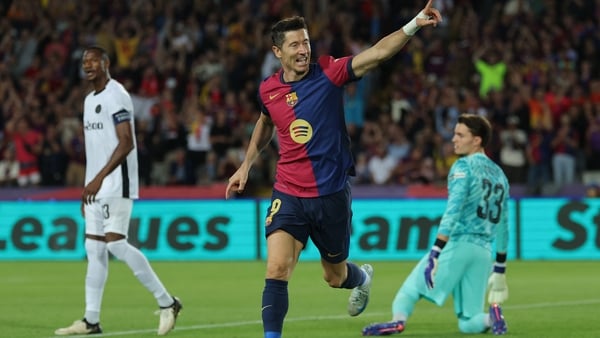 Robert Lewandowski celebrates his opening goal
