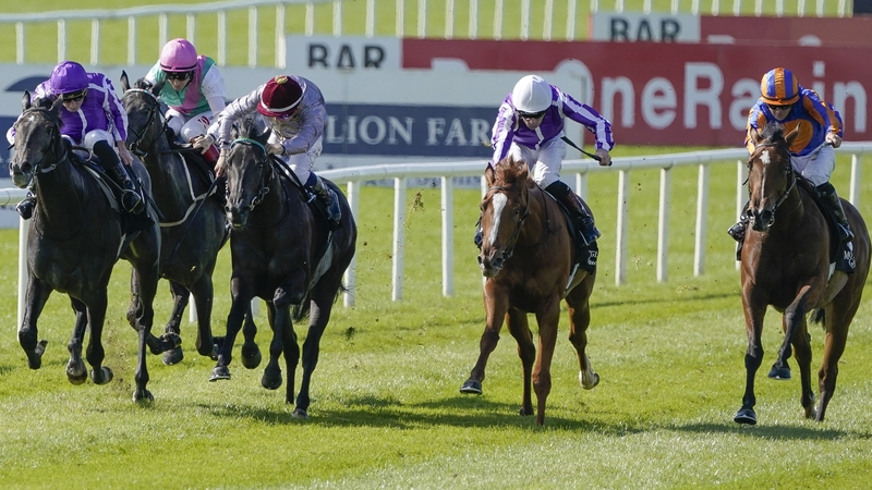 Simmering (grey with gold braid) filled the runner-up berth in a hot renewal of the Moyglare last time out