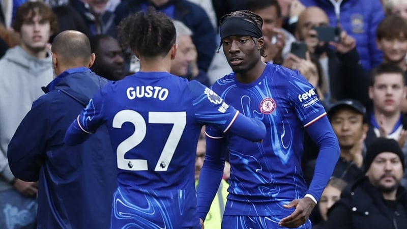 Noni Madueke (r) is congratulated by Malo Gusto