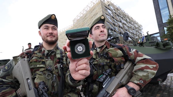 Corporal Gary Hui (left) and Trooper Phil Kenny, from the 1st Armoured Calvary Squadron Defence Forces Training Centre, Curragh Camp with the commemorative Centenary Irish Defence Forces coin