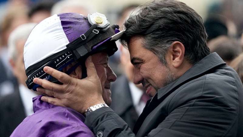 Kia Joorabchian (R) celebrating with Frankie Dettori after the jockey won the 2023 Qipco Champion Stakes on King Of Steel in his final career ride in Britain
