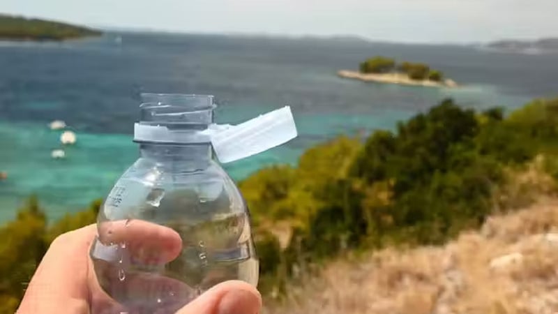 An EU directive means all single-use bottles now have caps that remain attached. Photo: Crordx/Shutterstock