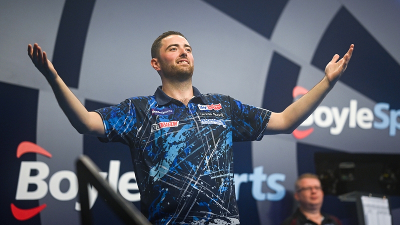 Luke Humphries kept his title defence on the right track