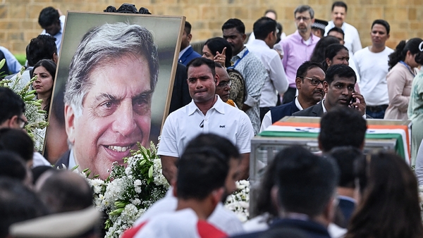 People gathered around the remains of Indian industrialist Ratan Tata in Mumbai today