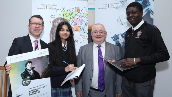 L-R: Senator Ronan Mullen, Chryselle Cardinho, Ceann Comharirle Seán Ó Fearghail, and James Johnston at the launch of the Oireachtas essay competition