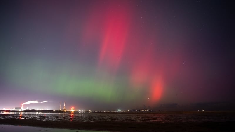 The Northern Lights seen from south Dublin over the Poolbeg towers