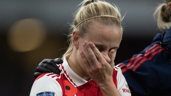 Beth mead of Arsenal leaves the field after suffering her ACL injury in November 2022