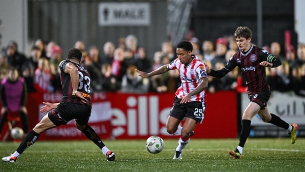 Sean Robertson of Derry in action against Bohs duo Jake Carroll and Paddy Kirk