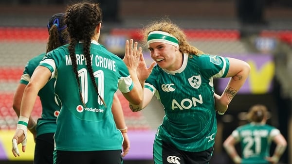 Amee-Leigh Murphy Crowe and Ruth Campbell celebrate Ireland's fourth try against the USA