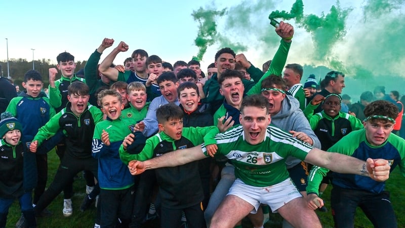 Mohill players and supporters, including Diarmuid Casey celebrate afterwards