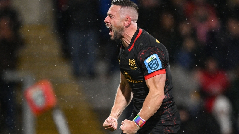 John Cooney, player of the match, celebrates scoring Ulster's third try