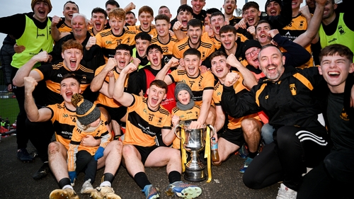 The St Eunan's team celebrate with the Dr Maguire Cup