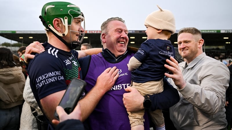 Loughmore-Castleiney manager Eamonn Kelly celebrates with his grandson Tadhg