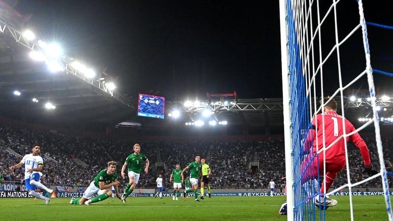Caoimhin Kelleher saves from Anastasios Bakasetas