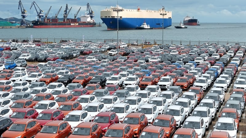 Chinese-made cars wait to be loaded for export at Yantai Port