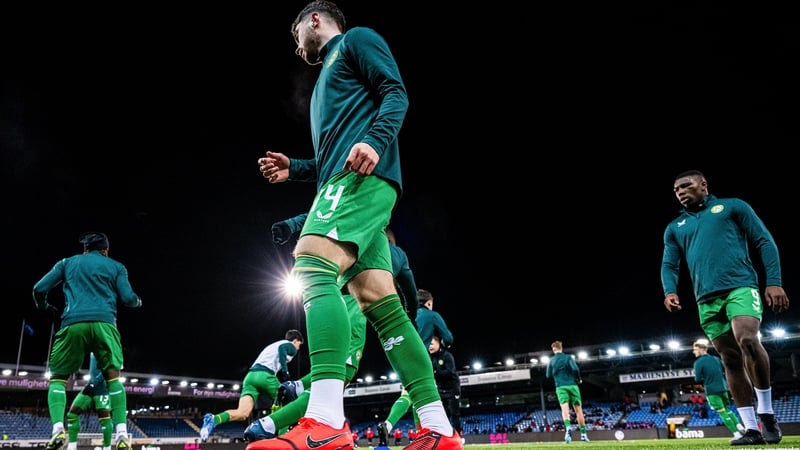 Sean Roughan (#14) and Sinclair Armstrong warming up before the reverse fixture away against Norway late last year