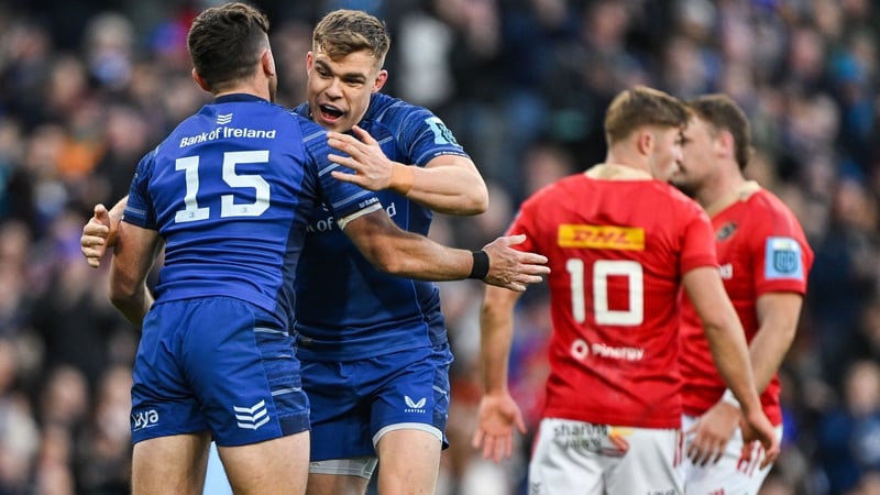 Munster had just 14 players on the field when Hugo Keenan (l) scored Leinster's third try