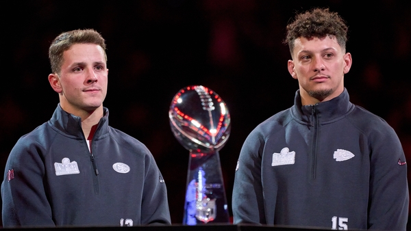 The Chiefs Patrick Mahomes (R) got his hands on the Vince Lombardi Trophy when they beat Brock Purdy's 49ers in Super Bowl LVIII in February
