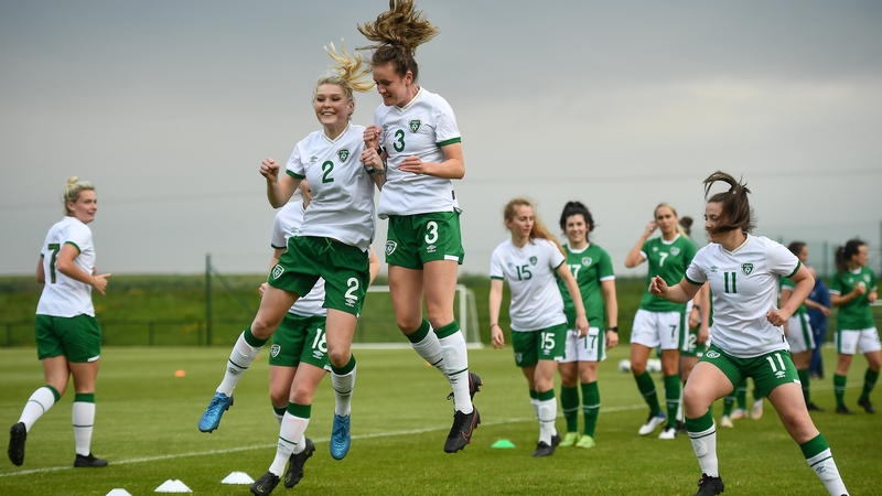 Éabha O'Mahony (L) and Heather Payne bump shoulders during a Republic of Ireland home-based training session back in 2021