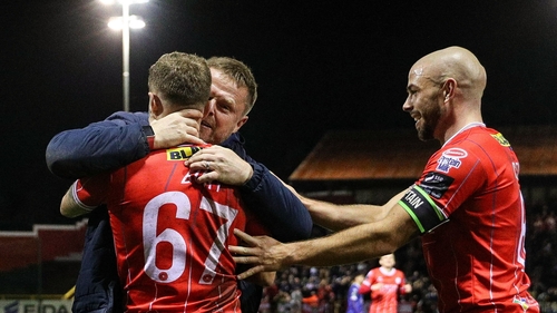 Shelbourne manager Damien Duff celebrates with Mark Coyle