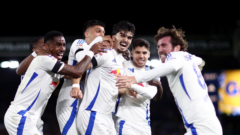 Pascal Struijk celebrates with his fellow Leeds players after opening the scoring