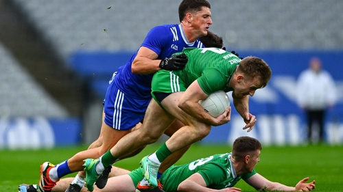 Sean Bugler of Leinster is fouled by Munster's Colm O'Callaghan
