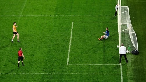 Odhran Murdock of Ulster scores the winning penalty