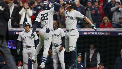 Juan Soto (22) with team-mate Giancarlo Stanton after hitting the winning home run against Cleveland