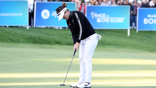 Hannah Green holes the winning putt