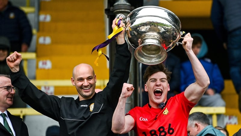 Dunshaughlin co-captains Niall Murphy, left, and Jarad Rushe lift the cup