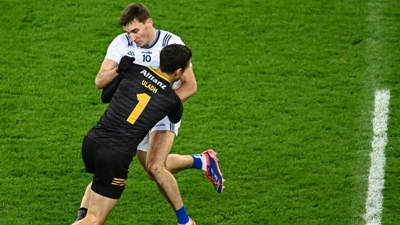 Matthew Tierney of Connacht tries to stop Ulster goalkeeper Niall Morgan from advancing up the pitch in the interpro final
