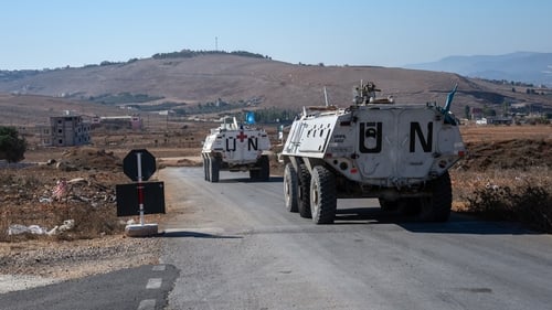 UNIFIL armoured personnel carriers depart a base to patrol near the Lebanon-Israel border. Photo: Getty Images
