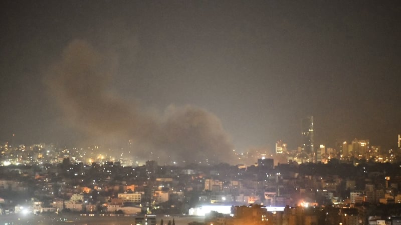 Smoke rises from areas targeted by an Israeli air strike in Beirut's southern suburbs