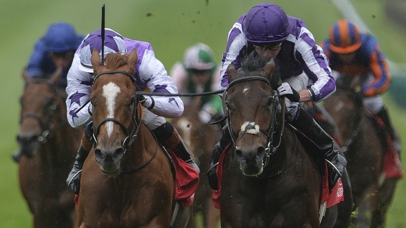 Ryan Moore riding Delacroix (right) to victory at Newmarket