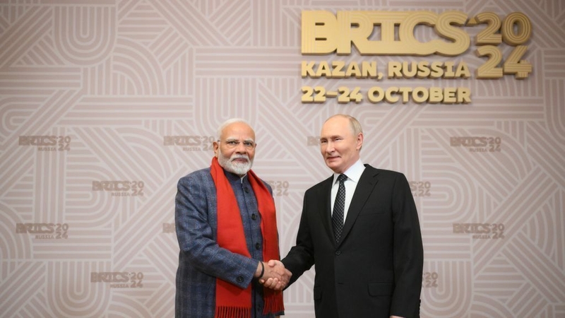 Vladimir Putin with India's Prime Minister Narendra Modi at the opening day of the BRICS summit