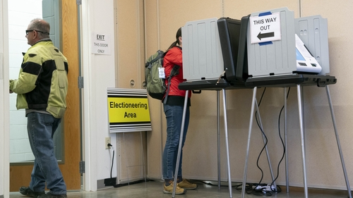 People cast early votes at a polling station in Asheville, North Carolina