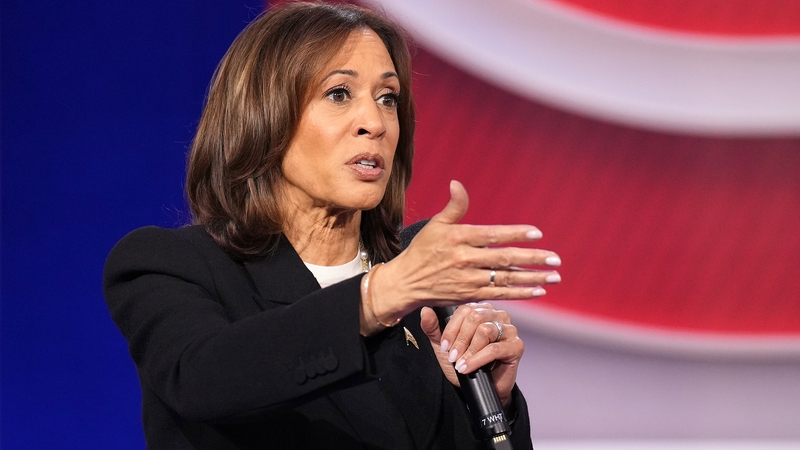 Kamala Harris speaks to an attendee during a televised town hall in Pennsylvania