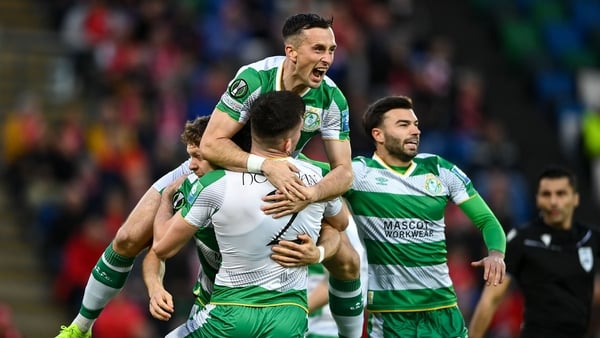 Josh Honohan is mobbed by Aaron McEneff after scoring Shamrock Rovers' first goal