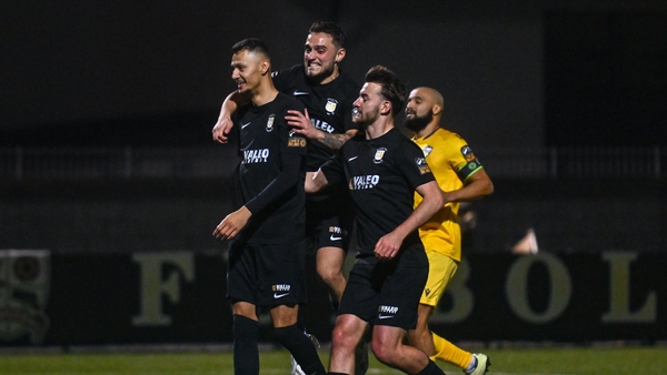 Dean Ebbe (L) celebrates netting the winner