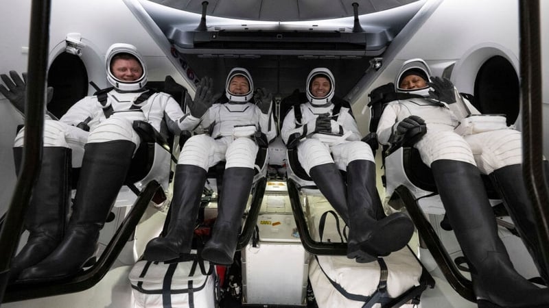 Roscosmos cosmonaut Alexander Grebenkin (L), NASA astronauts Michael Barratt (2nd L) Matthew Dominick (2nd R) and Jeanette Epps