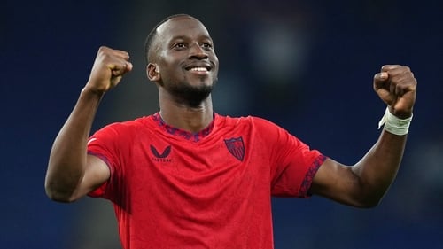 Sevilla's Dodi Lukebakio celebrates after the game